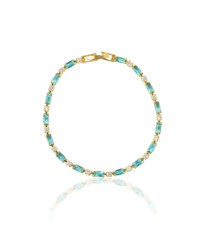 Elegant armband i naturlig turkos och guld