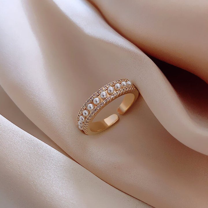 Lyxring med Pärlor och Guld