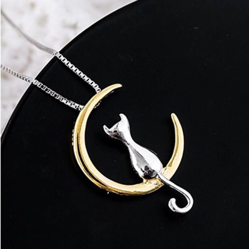Stilfull katt-halsband med halvmåne och kattmotiv