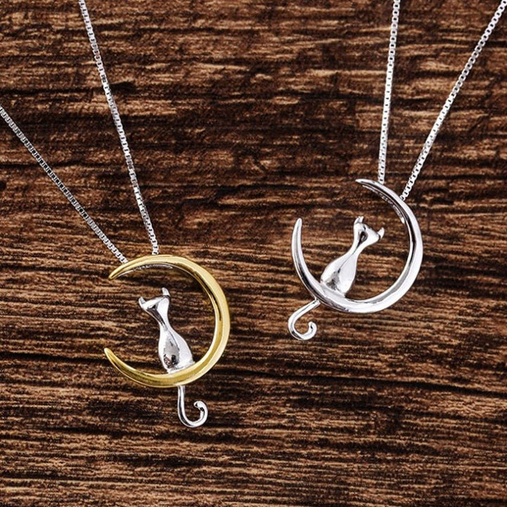 Stilfull katt-halsband med halvmåne och kattmotiv
